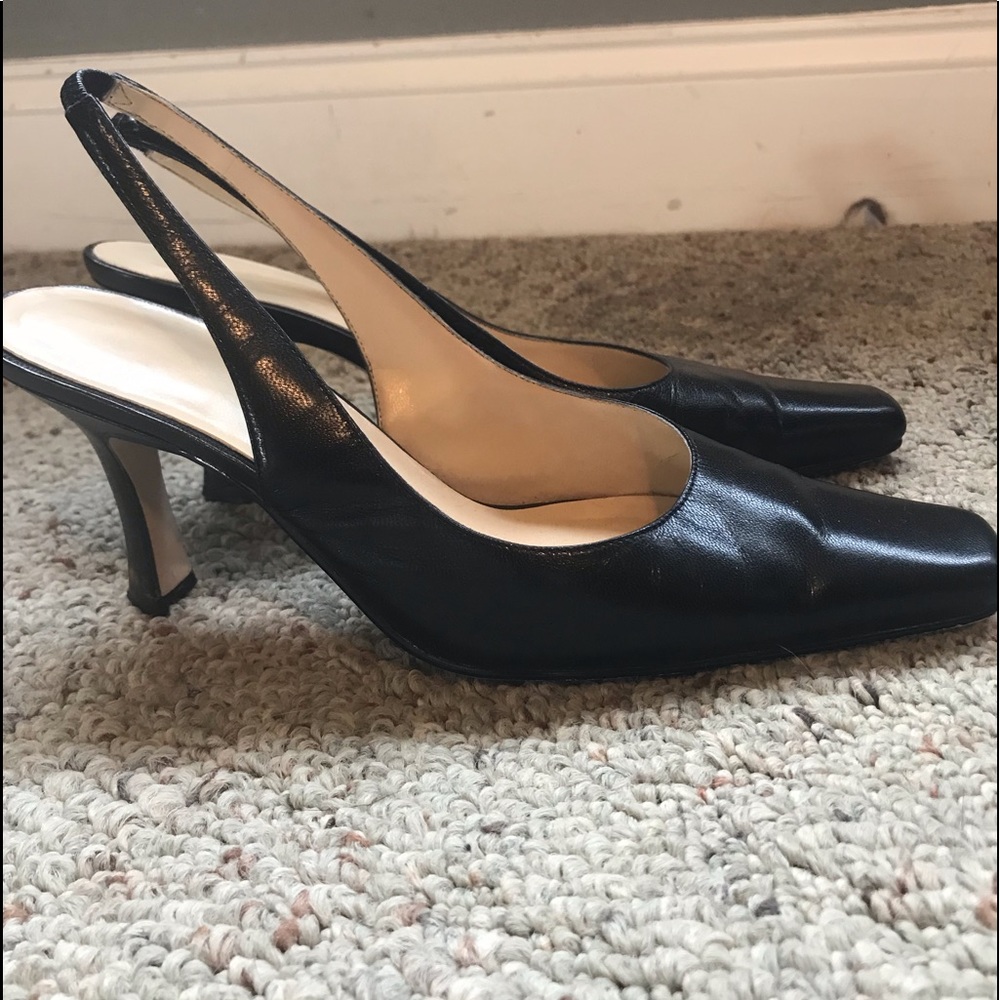 Stylish black sling back heel